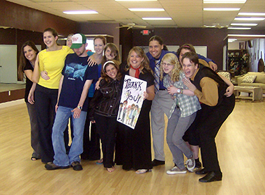 Teens holding a thank you sign